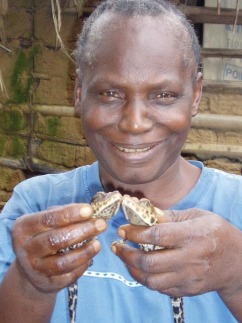 Woman with Osteolaemus tetraspis 1